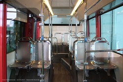 Электробус Irizar i2e BRT (ie Tram).
Полупрозрачные сиденья, много хрома и красные стойки кузова.